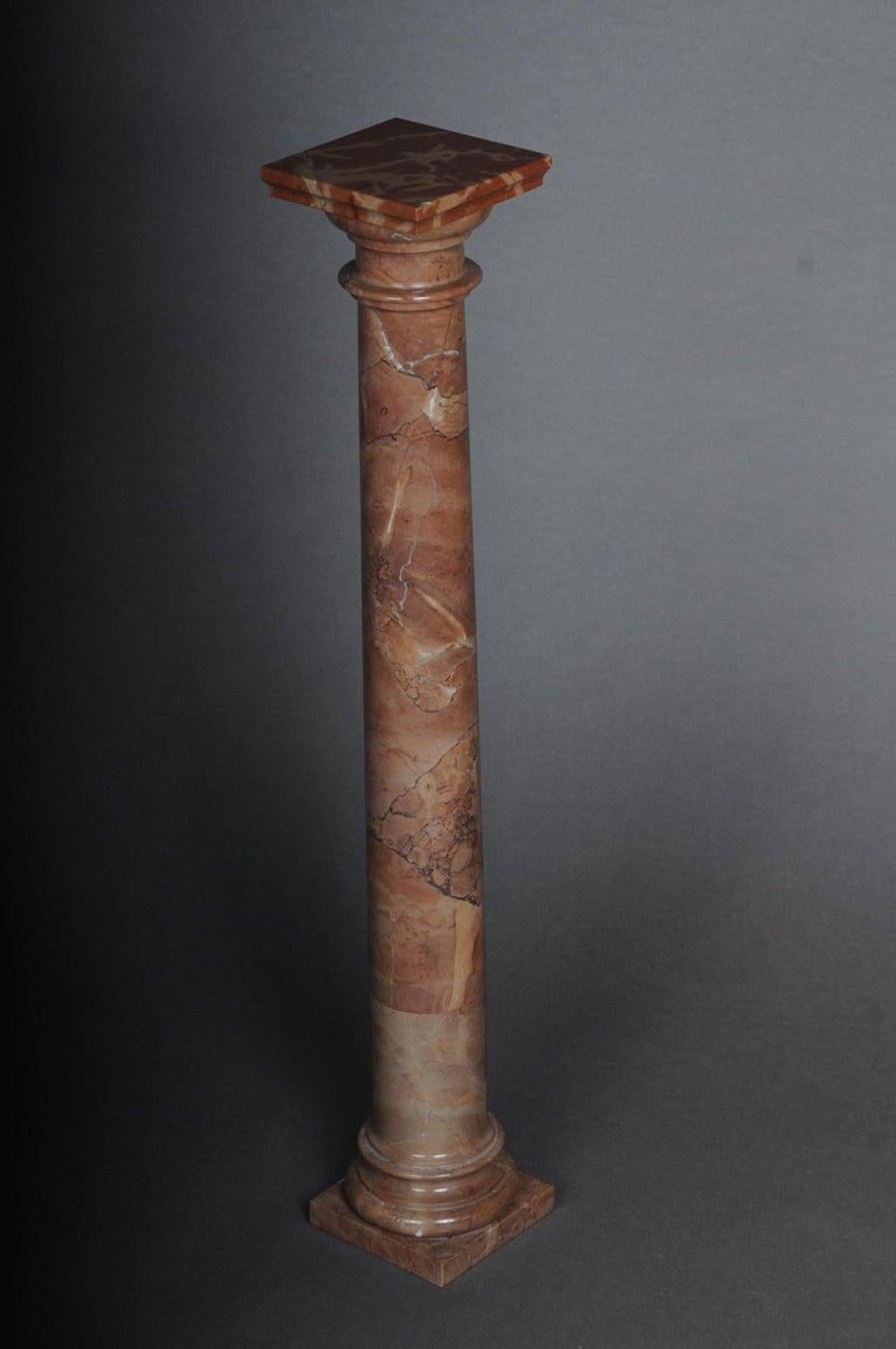 Delicate marble column red onyx, 20th century.

Classic shape, red mottled marble with structure.
Natural marble in red onyx. Square plinth with balustraded column base. Slightly protruding, stepped square cover plate.

