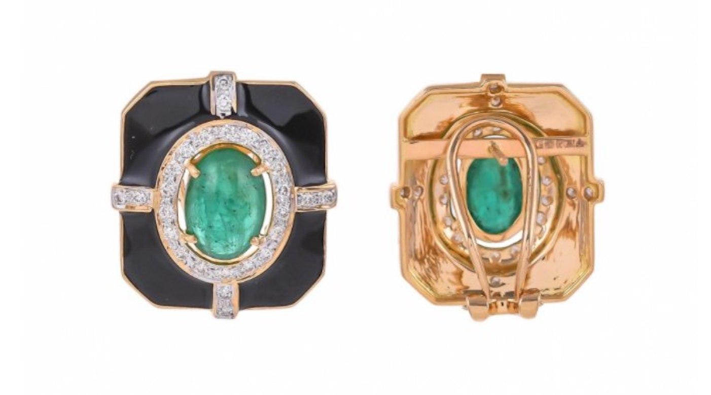 5.69 Carat Emerald Diamond And Black Enamel 18 Karat Yellow Gold Earrings

Possible to make  Clip- On

Modern and stylish this 18 karat earring features a bold, geometric shape set with the eccentric combination of 5.69 carats emerald surrounded by