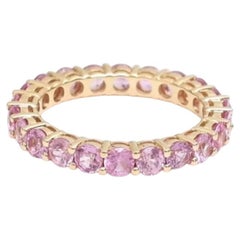 2,93 Karat rosa Saphir, Ewigkeitsring aus 14-karätigem Gelbgold