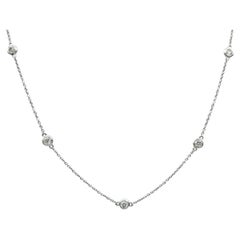 Delicate Round Cut Bezel Set Diamond Station Necklace in 14 Karat White Gold
