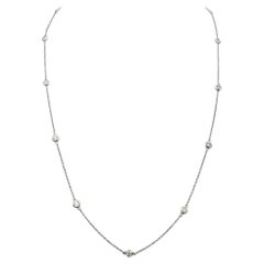 Delicate Round Cut Bezel Set Diamond Station Necklace in 14 Karat White Gold