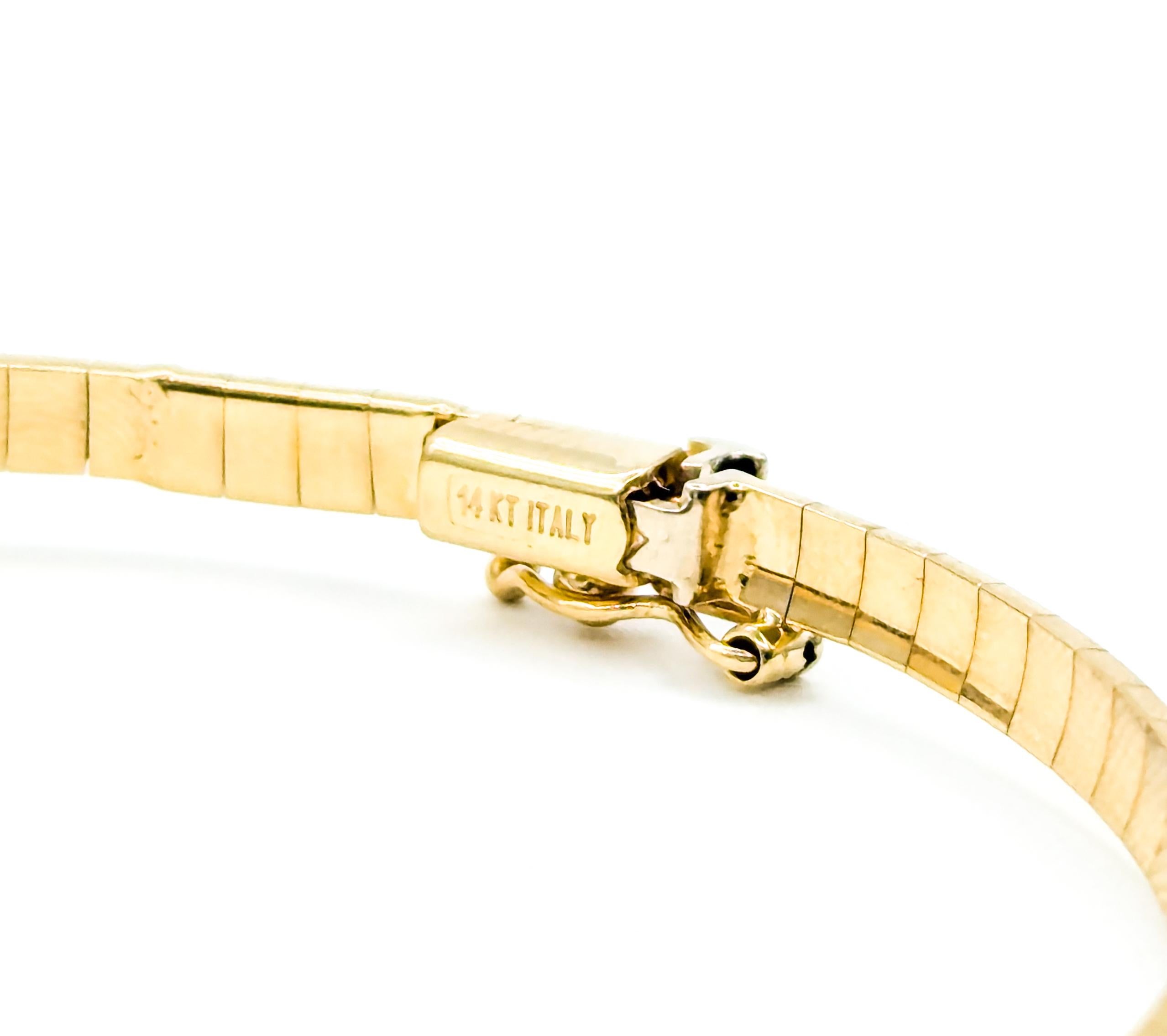Bracelet Omega délicat en or jaune avec rubis et diamants Pour femmes en vente