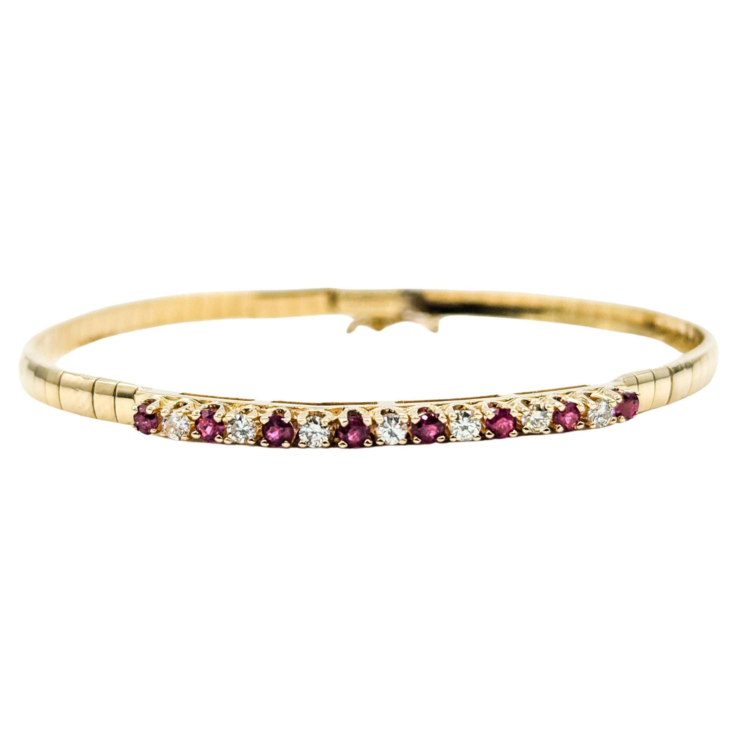 Bracelet Omega délicat en or jaune avec rubis et diamants