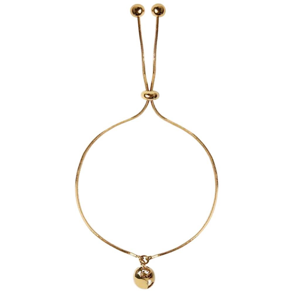 Delicate World Charm Chain adjustable bracelet in yellow gold plating  For Sale