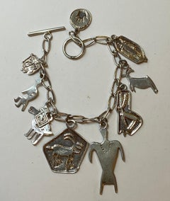 Delicately Whimsical Sterling Silver Charm Bracelet