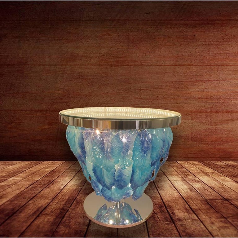 Modern Italian illuminated table with infinity lit mirror, dressed with blue and aquamarine Murano glass leaves mounted on chrome metal base / Designed by Fabio Bergomi for Fabio Ltd / Made in Italy
LED type lights
Diameter: 27.5 inches / Height: