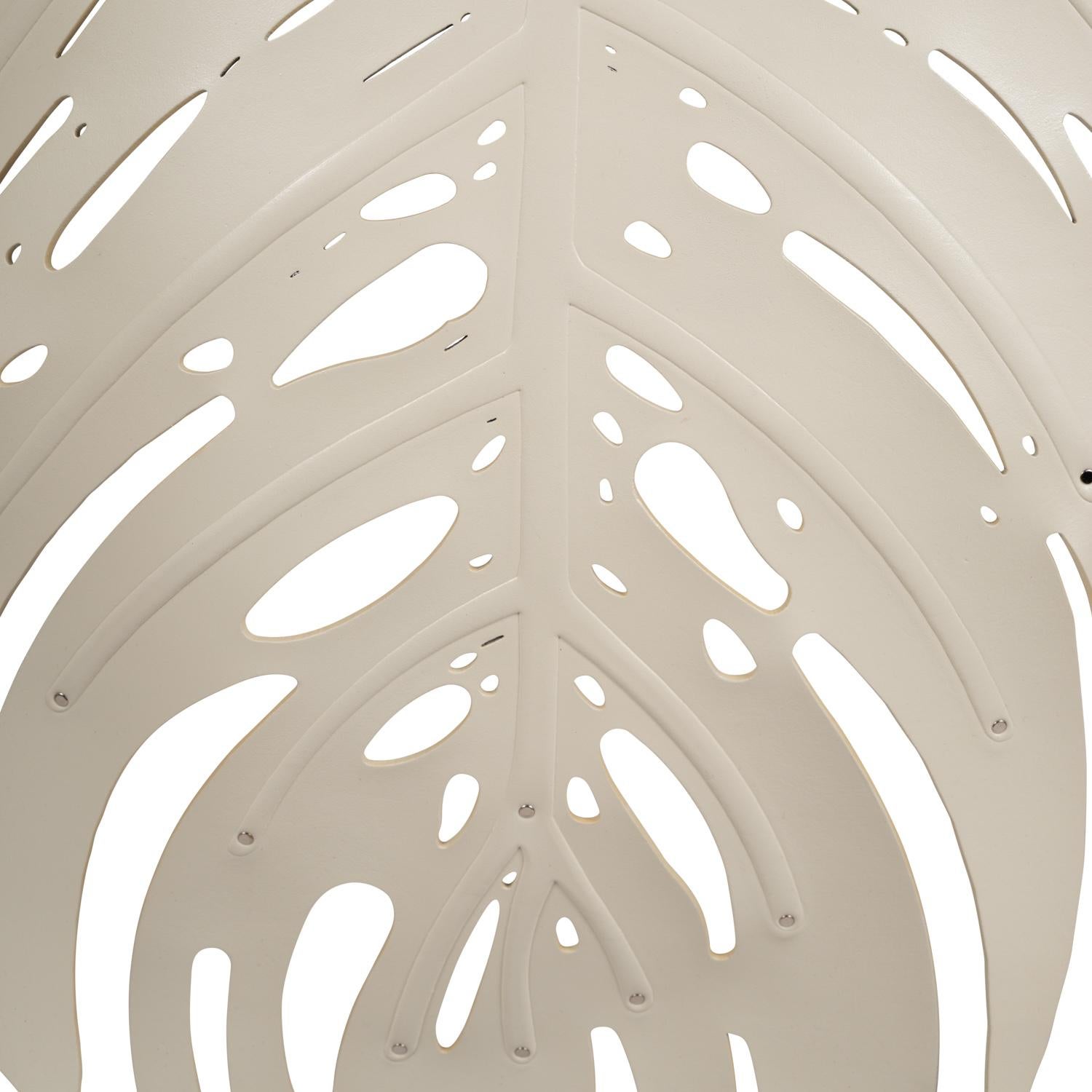 The “Delicious Monster” wall sconce is inspired by nature and the Philodendron Monstera plants found throughout the coastal regions of southern Africa. Conceived and handmade in the Durban, South Africa studio of Xavier Clarisse, each piece is