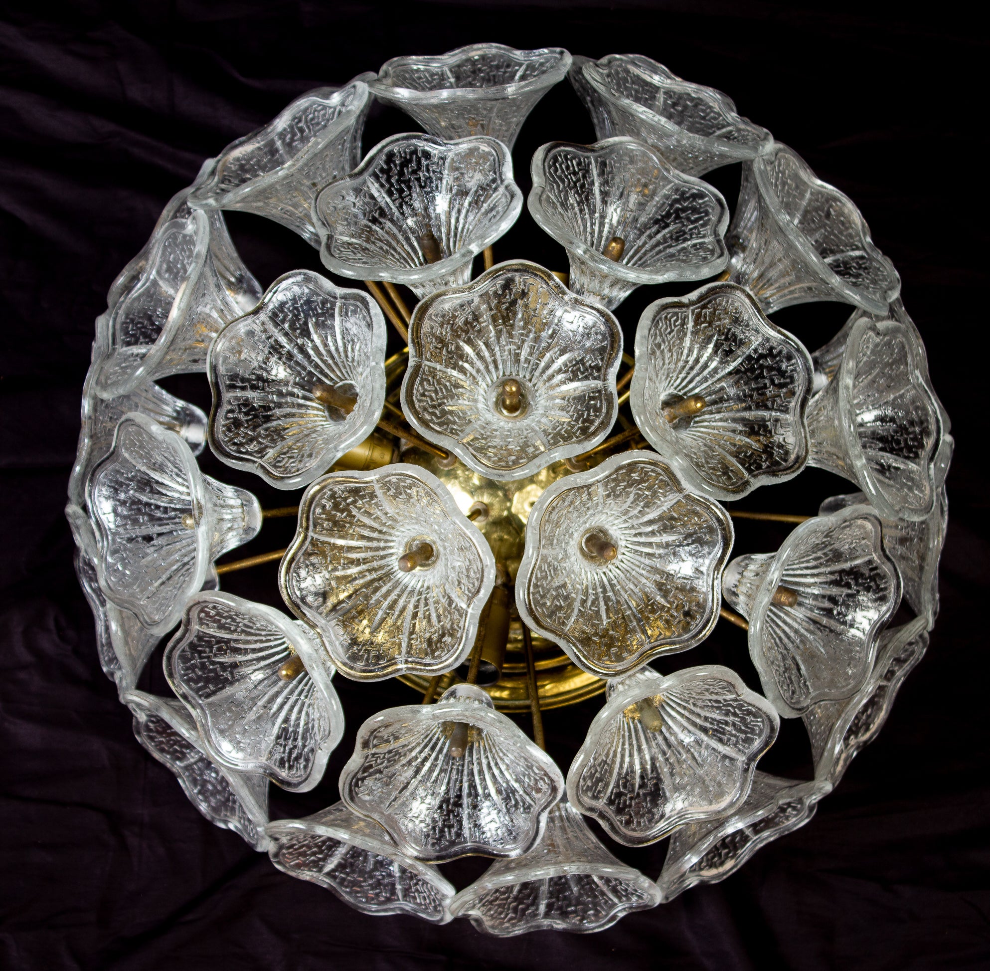 Flushmount Murano glass chandelier by Paolo Venini for VeArt, Italy, with clear glass flowers on a brass Sputnik frame. Amazing eye-catching piece designed in the 1960s, Italy. The lamp takes four E 14 bulbs.
Price is for 1 item. 
Available also the