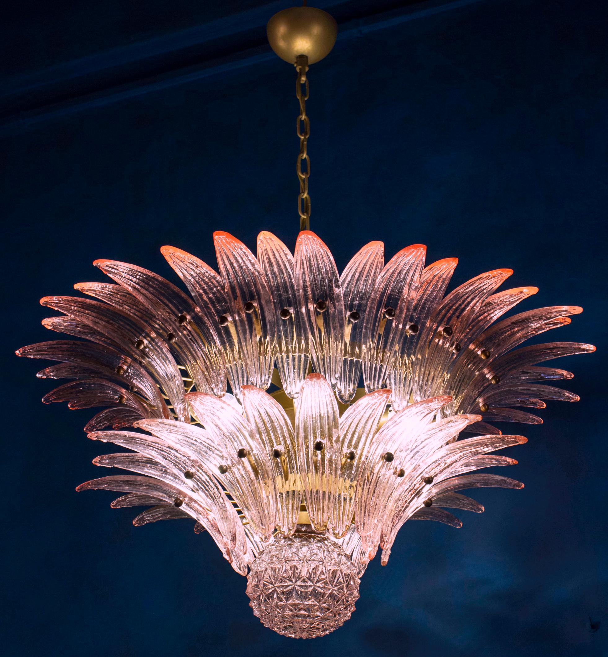 Luxury pink Palmette Murano glass chandelier with a gold metal frame.
Available also a pair and a pair of sconces.
8 light bulbs, E27 dimension
Dimensions: Chandelier 43.30 inches (110 cm), height with chain. Without chain 21.6 inches (55