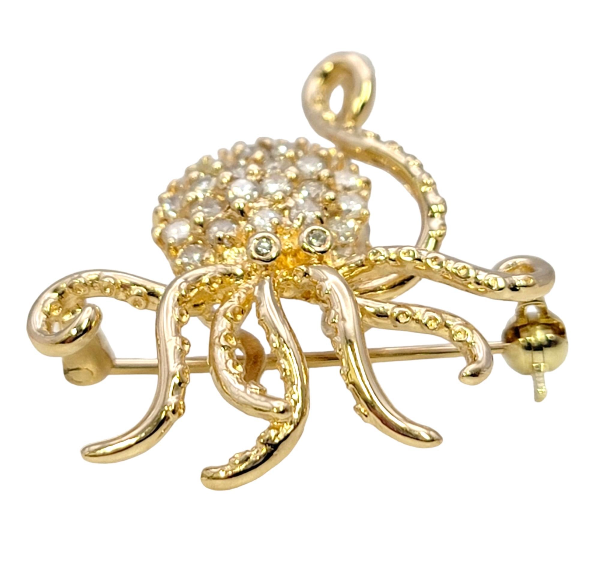 Calling all ocean lovers! This charming little octopus brooch / pendant will remind you of a dazzling day out at the sea. The modernized octopus motif is embellished with glittering natural diamonds, shimmering beautifully in the light and creating