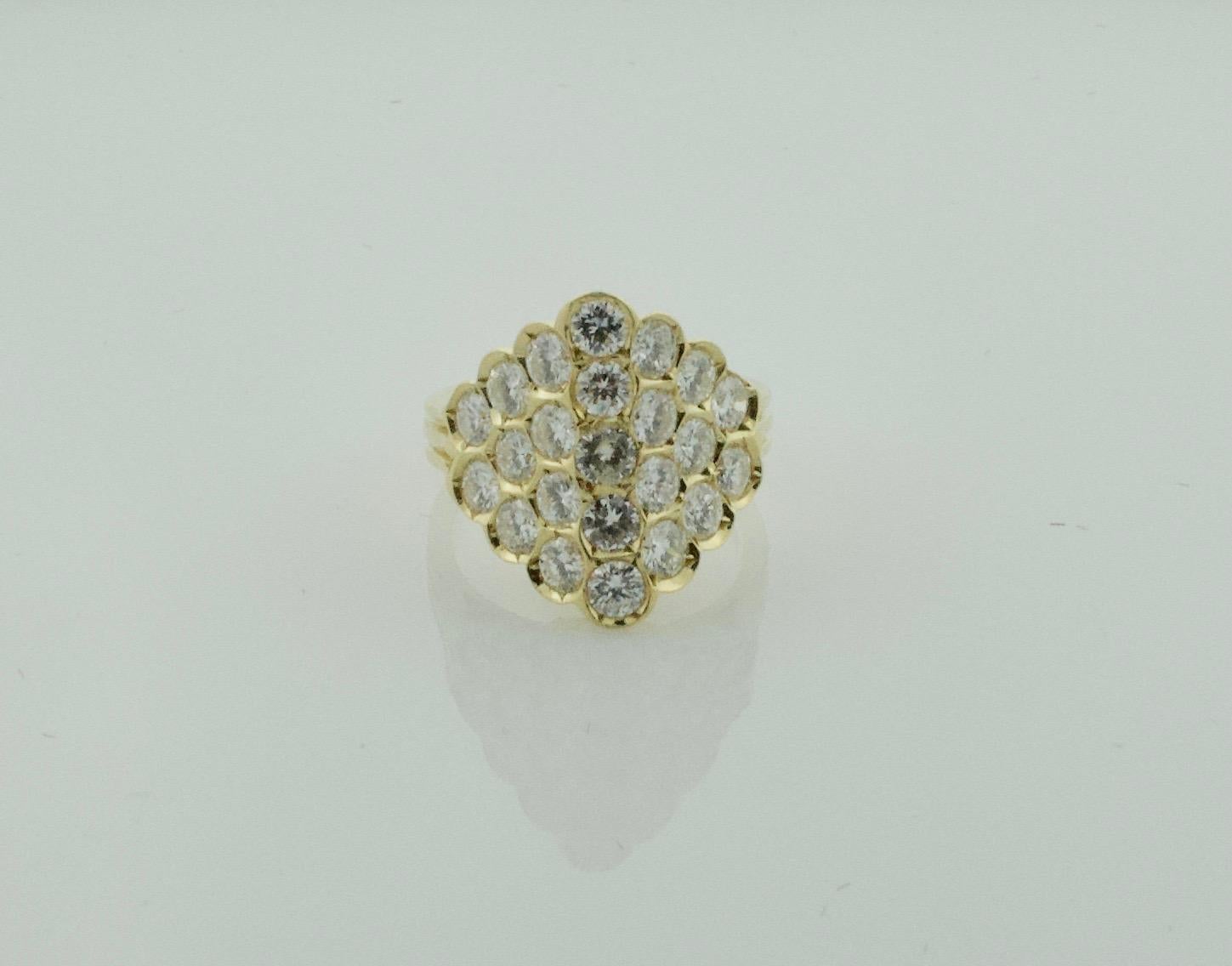 Delightful 18k Diamond Ring in Yellow Gold
23 Round Brilliant Cut Diamonds Weighing 2.15 Carats Approximately [GH VVS]
Currently Size 4.5 Can Easily Sized By Us or Your Qualified Jeweler