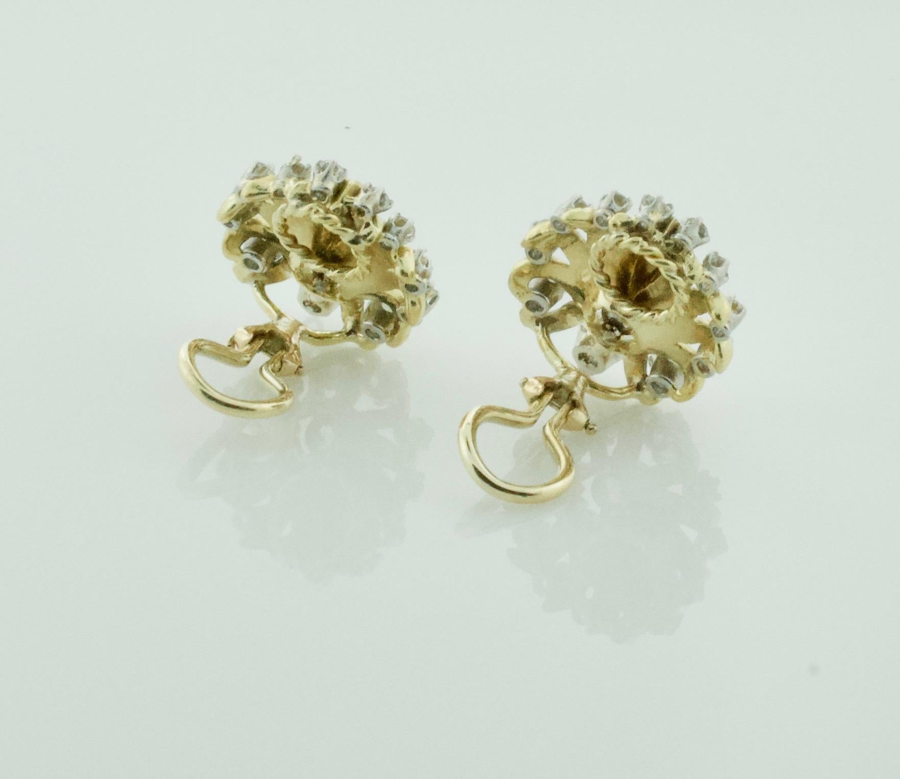 indulge in the vintage elegance of these Delightful 18k yellow and white gold earrings from the 1950s. Featuring 8 round brilliant cut diamonds weighing approximately 1.30 carats, and 16 round brilliant cut diamonds weighing approximately .50