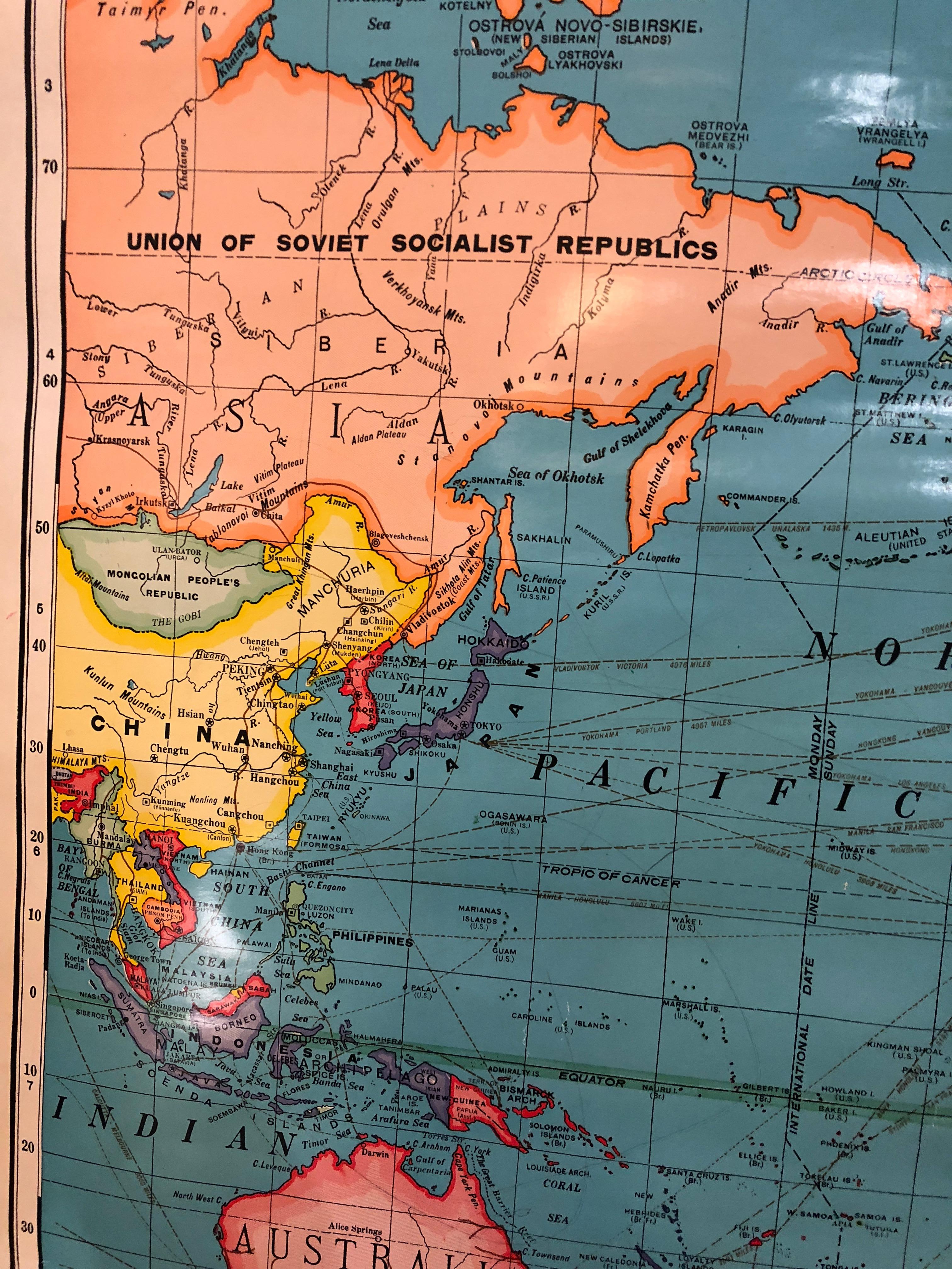 Fabulous wall decor, Cram's world roller map with wooden rods top and bottom, great details and color. Map itself is 51 inches wide.