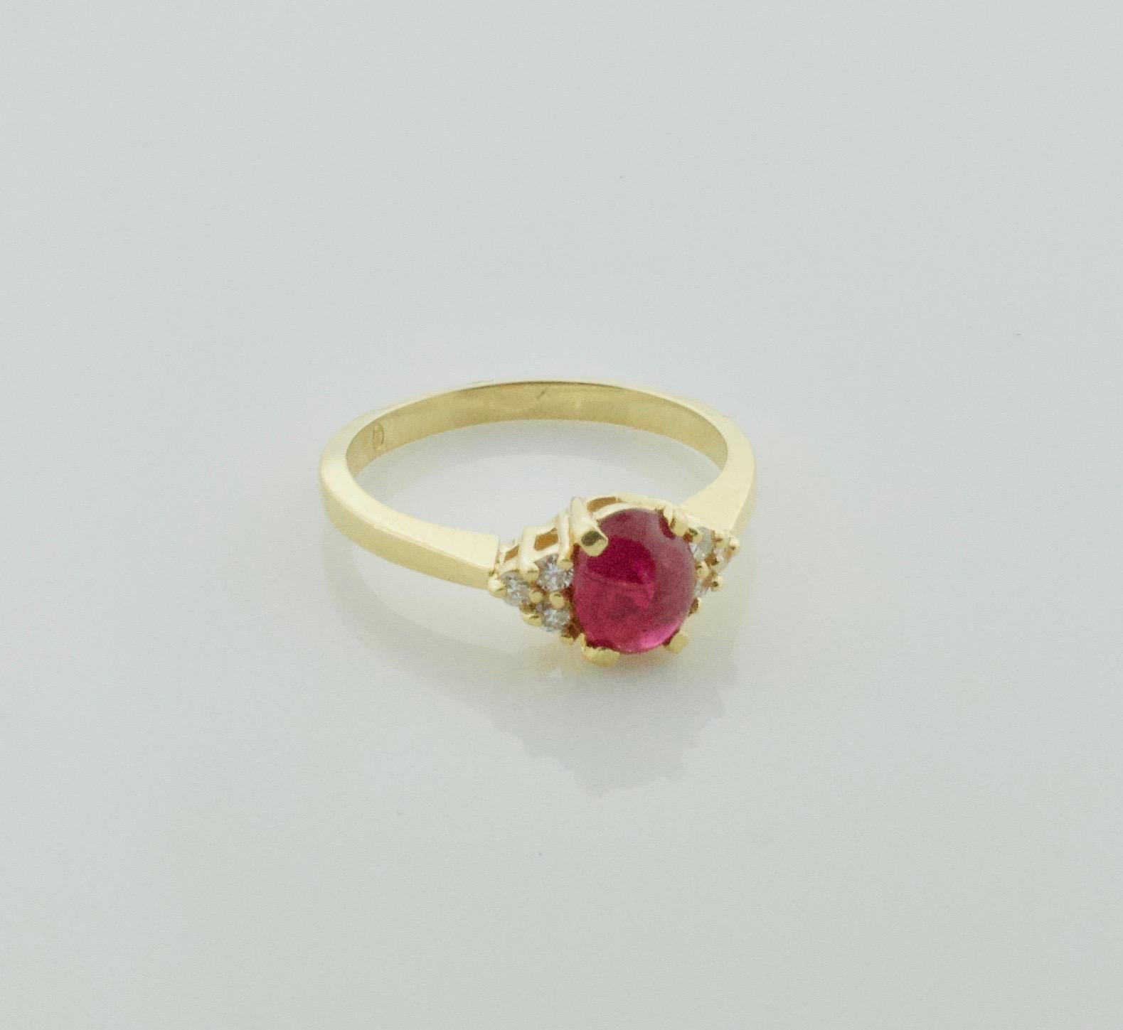 Delightful Cabochon Ruby and Diamond Solitaire Ring in 18k
One Cabochon Ruby weighing 1.12 carats [bright with no imperfections visible to the naked eye]
Six Round Brilliant Cut Diamonds weighing .12 carats [GH- VVS-VS1]
Currently Size 6.5 Can Be