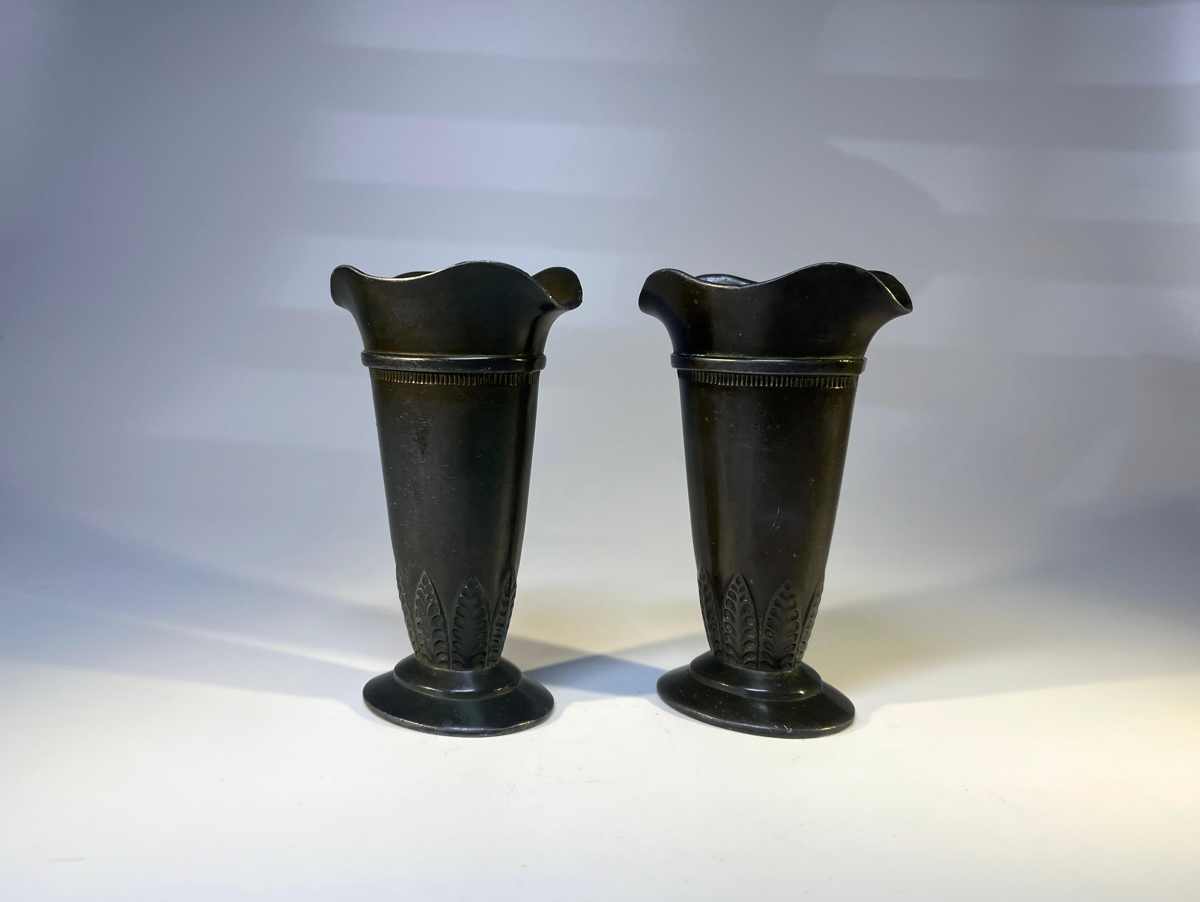 Pair of diminutive Just Andersen Disko metal flared flower vases with rich patina
Delicate in design and particularly decorated at base with stylised leaves
Stamped and numbered D55 to bases
Circa 1930's
Height 3.75 inch, Width 2.5 inch, Depth