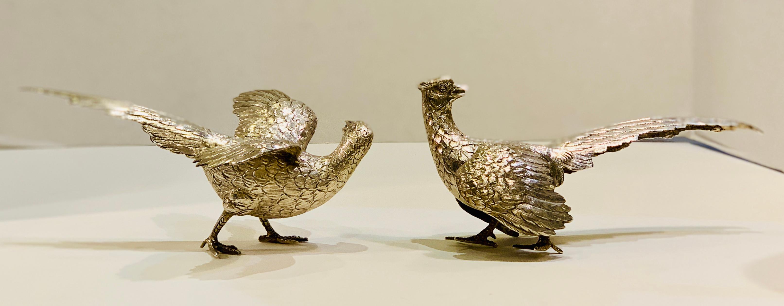 A delightful pair of handmade, minutely detailed estate European table pheasants are realistically modeled and chased, with stunning and realistic detailing of their plumage and anatomical features.

Hallmarked on the bottom of the feet, “915”