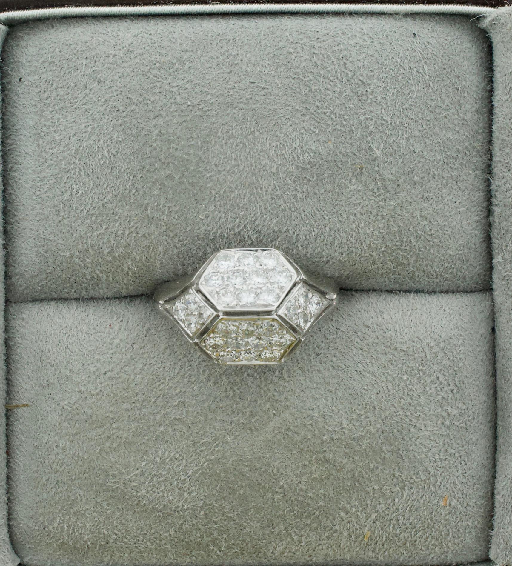 Delightful Platinum Modular Diamond Ring in Platinum circa 1960's
Twenty Six Round Brilliant Cut Diamonds Weighing .80 Carats Approximately [GH VVS-SI1]
Currently Size 6 Can Be Sized By Us Or Your Qualified Jeweler