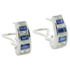 Delightful Sapphire and Diamond Earrings by "DeHago" in White Gold