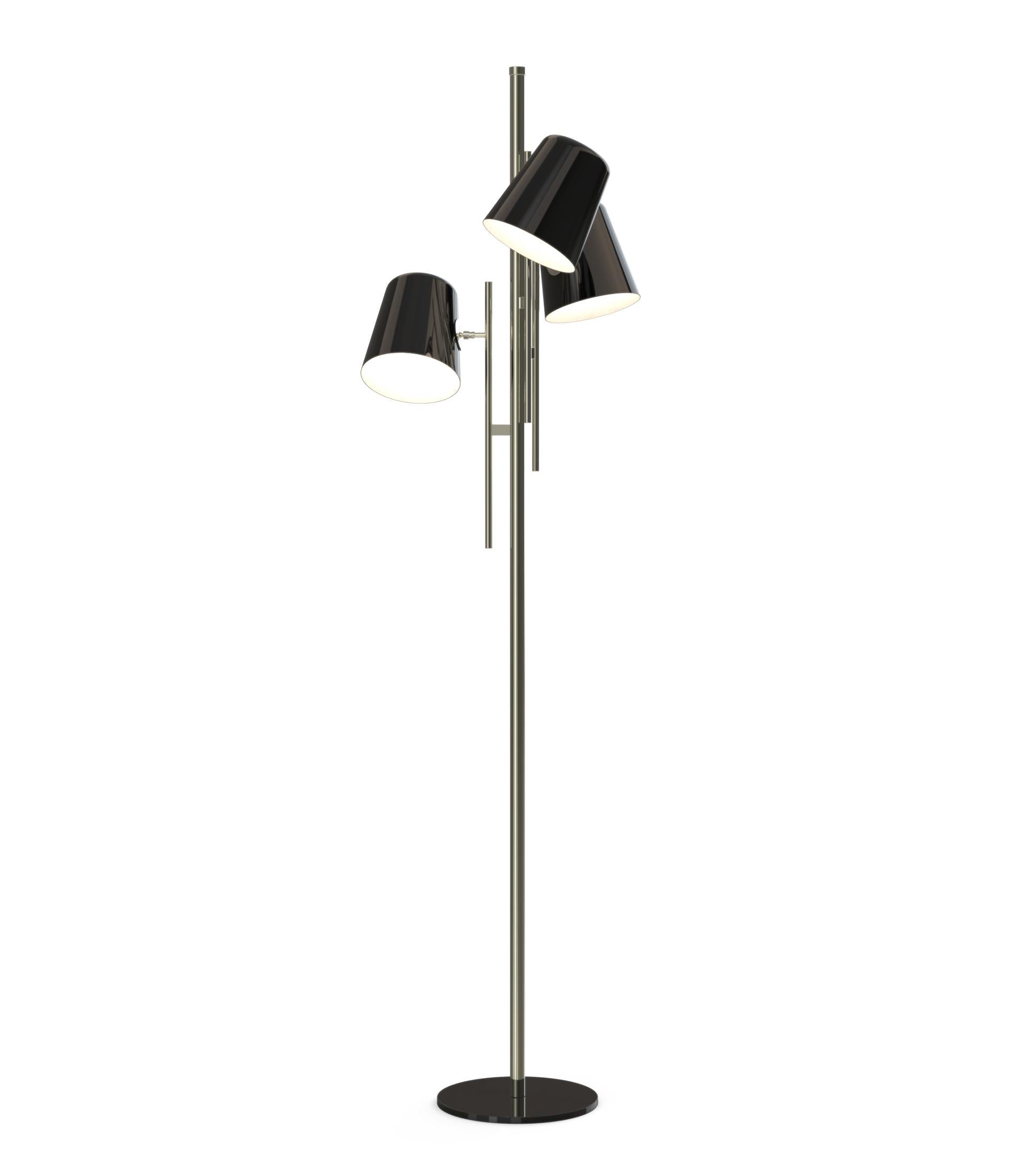 Cole is a retro-inspired floor lamp that has a three-shade design with a glossy black exterior and a matte white interior finishing. The three-cone shades provide plenty of styles as well as flexible lighting. Therefore, these adjustable heads Cole