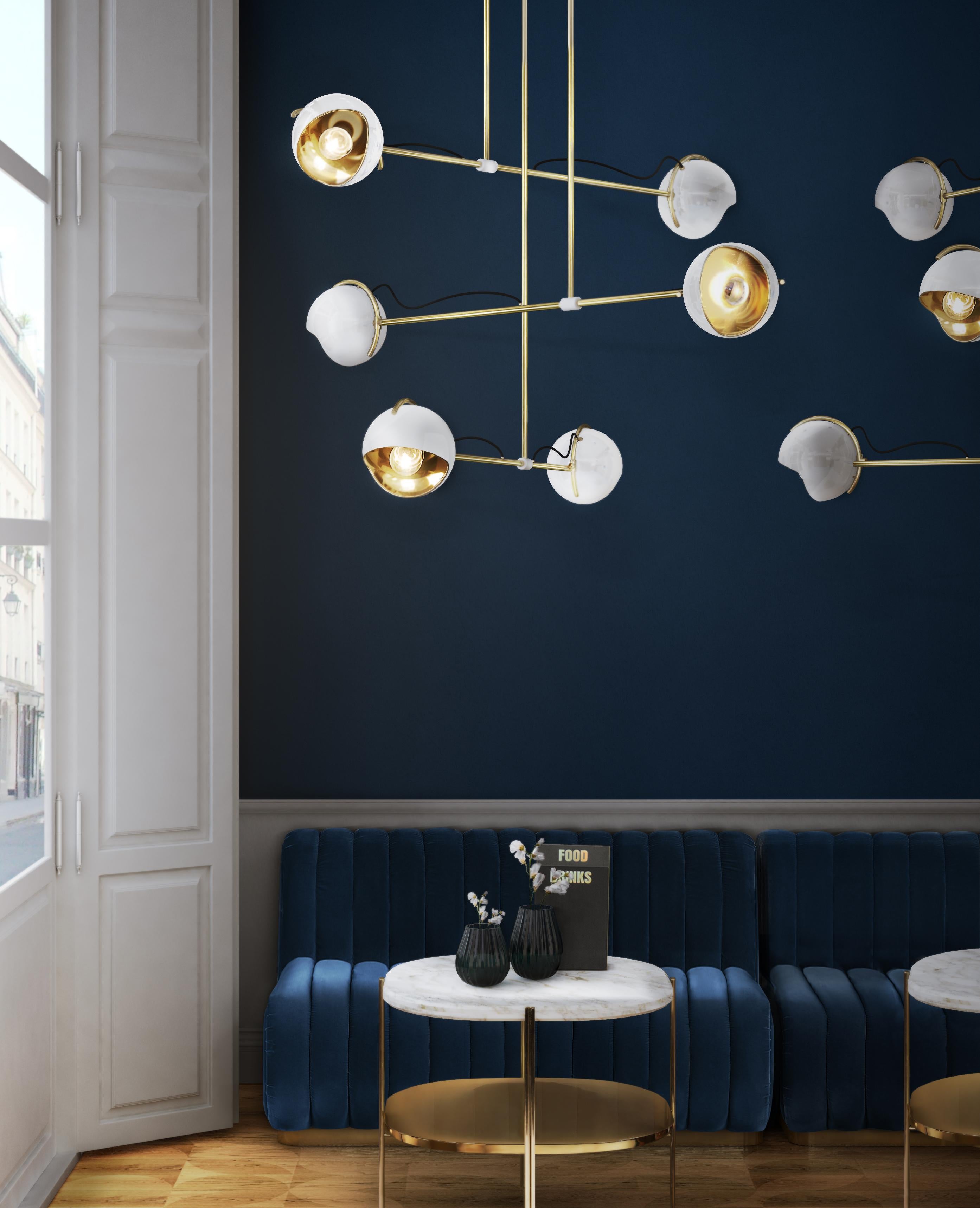 Delightfull designers created Laine suspension lamp with the midcentury vibe in mind. Inspired by the iconic era that brought so much culture to the world, this set of spotlights arranged like magic is in your home, this modern ceiling light comes