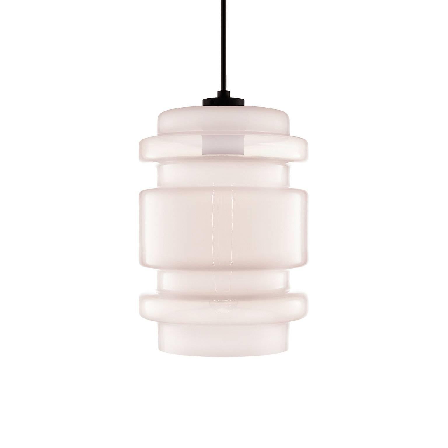 Unique to the Crystalline series, the Delinea pendant light features a dynamic shape and vibrant colors. Pairs easily with the Trove, Axia, and Calla pendants that also comprise the Crystalline series. Every single glass pendant light that comes