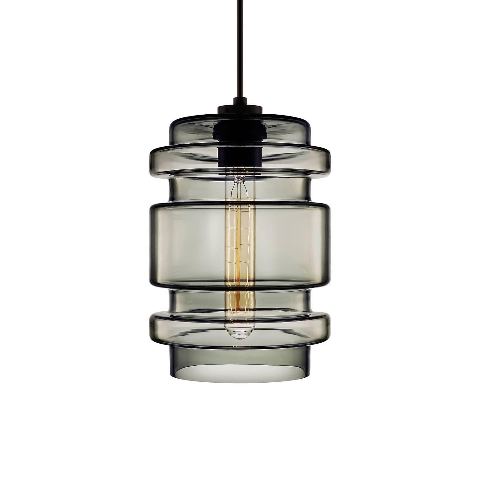 Unique to the Crystalline Series, the Delinea pendant light features a dynamic shape and vibrant colors. Pairs easily with the Trove, Axia, and Calla pendants that also comprise the Crystalline Series. Every single glass pendant light that comes