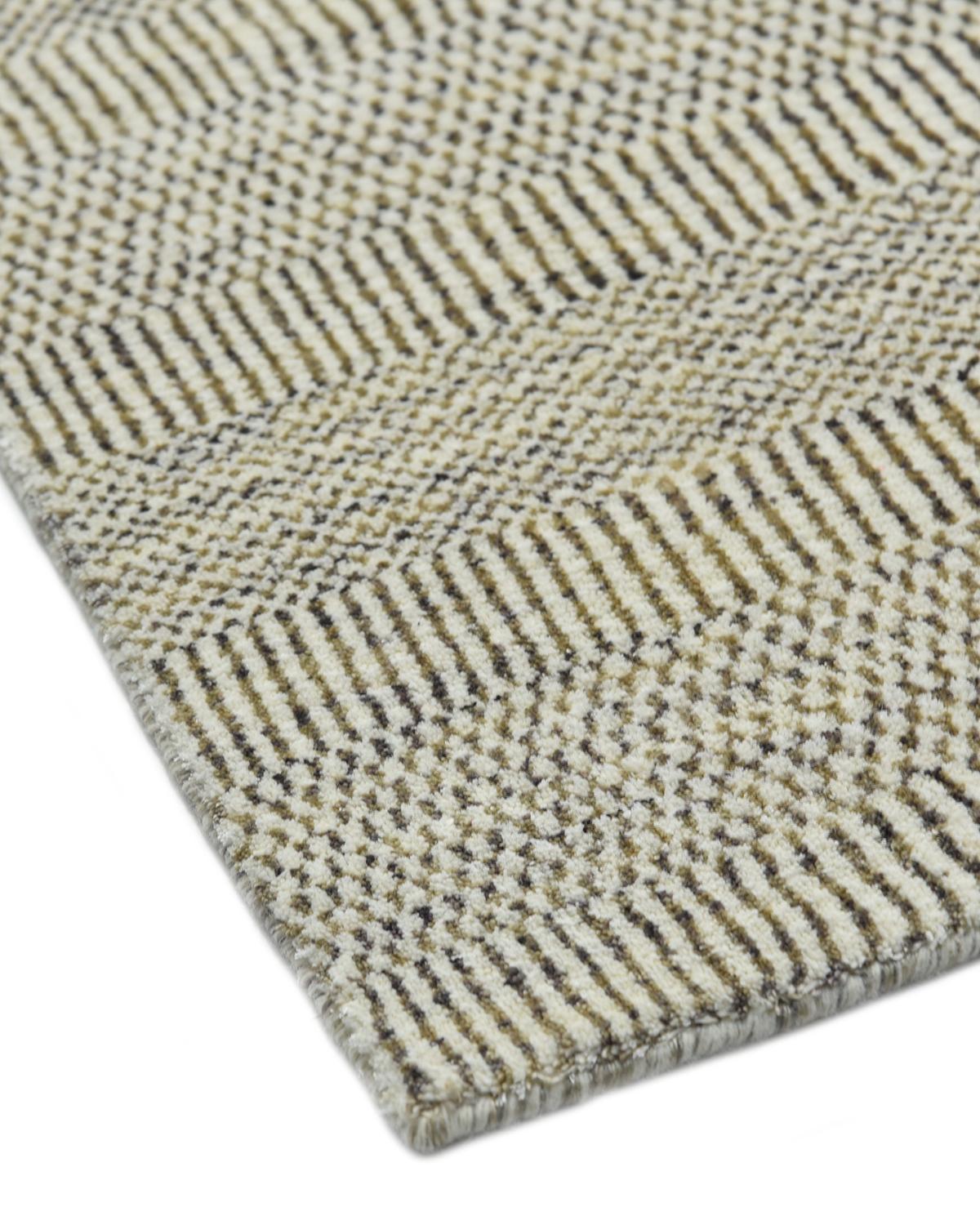 Color: Oat - Made in: India. 60% viscose, 30% wool, 10% cotton. Subtle tone-on-tone stripes give the Solid collection a depth and sophistication all its own. These rugs can pull the disparate elements of a room into a beautifully cohesive whole;