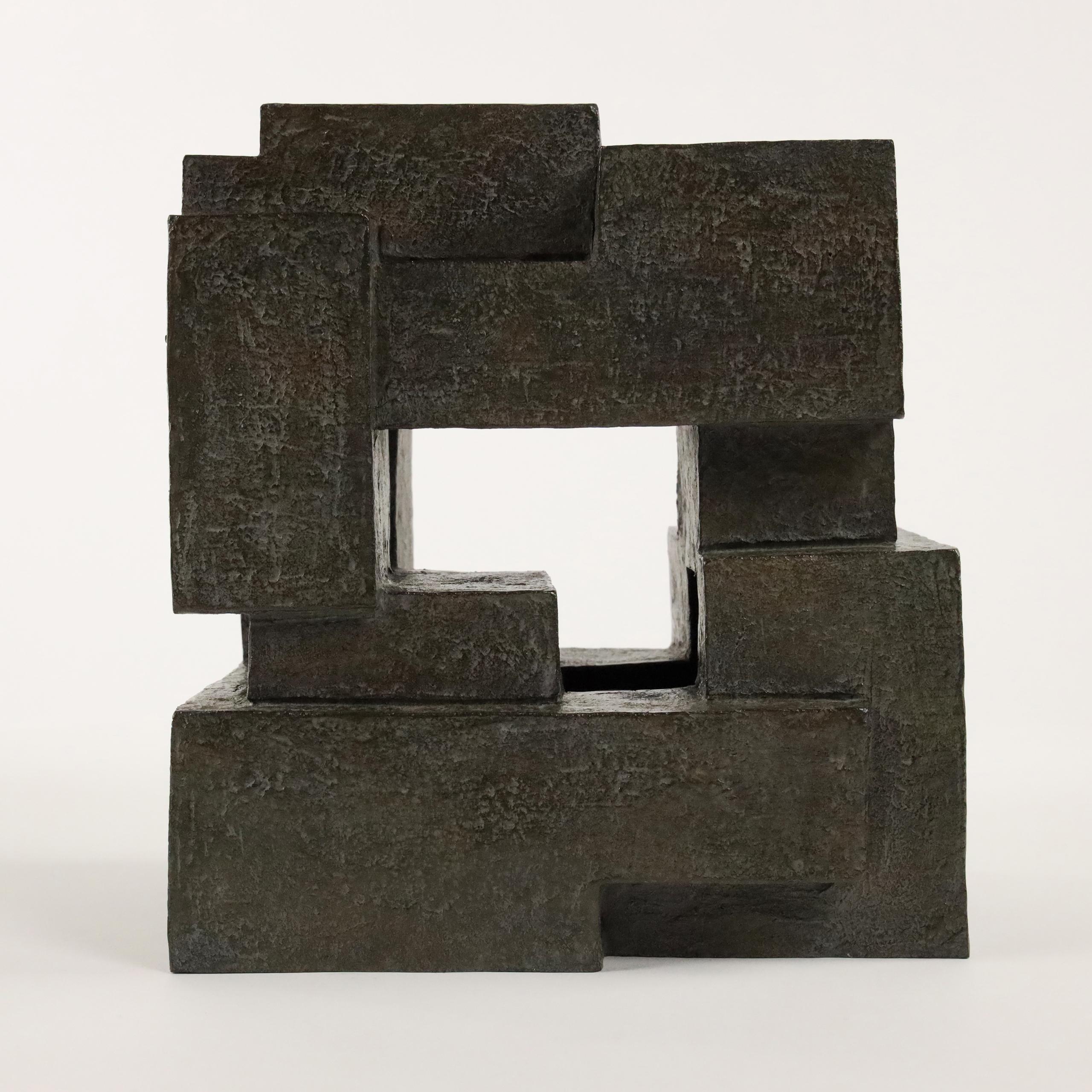 Block VIII is a bronze sculpture by French contemporary artist Delphine Brabant from the series "Architecture".
23 cm × 20 cm × 16 cm. Limited edition of 8 and 4 artist's proofs.
In this series, the artist designs geometric shapes bringing together
