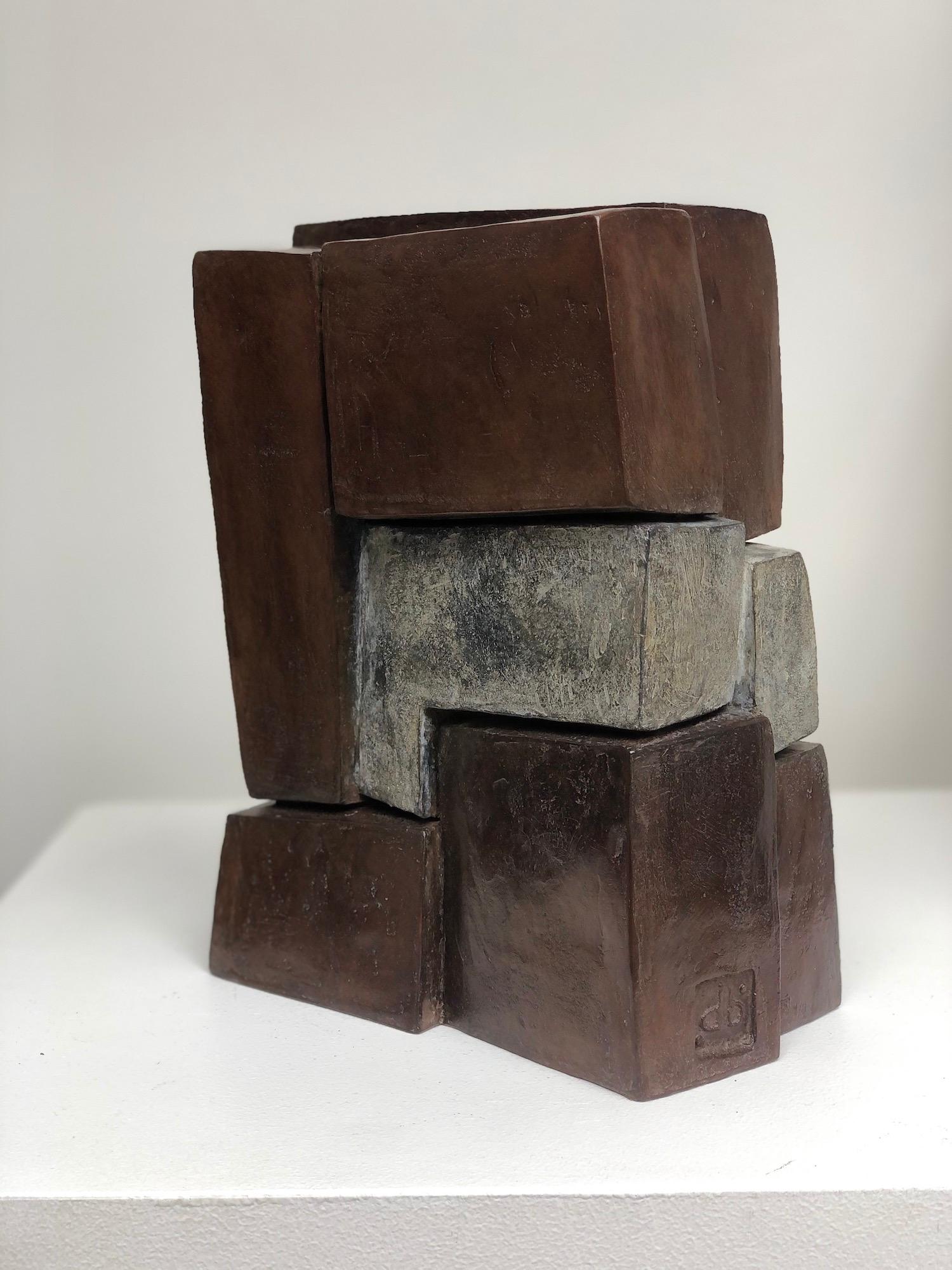 Unity II, is a bronze sculpture by French contemporary artist Delphine Brabant.  25 cm × 12 cm × 12 cm. Limited edition of 8 + 4 A.P.

Fascinated with the concept of construction, Delphine Brabant composes her abstract sculptures like an architect,