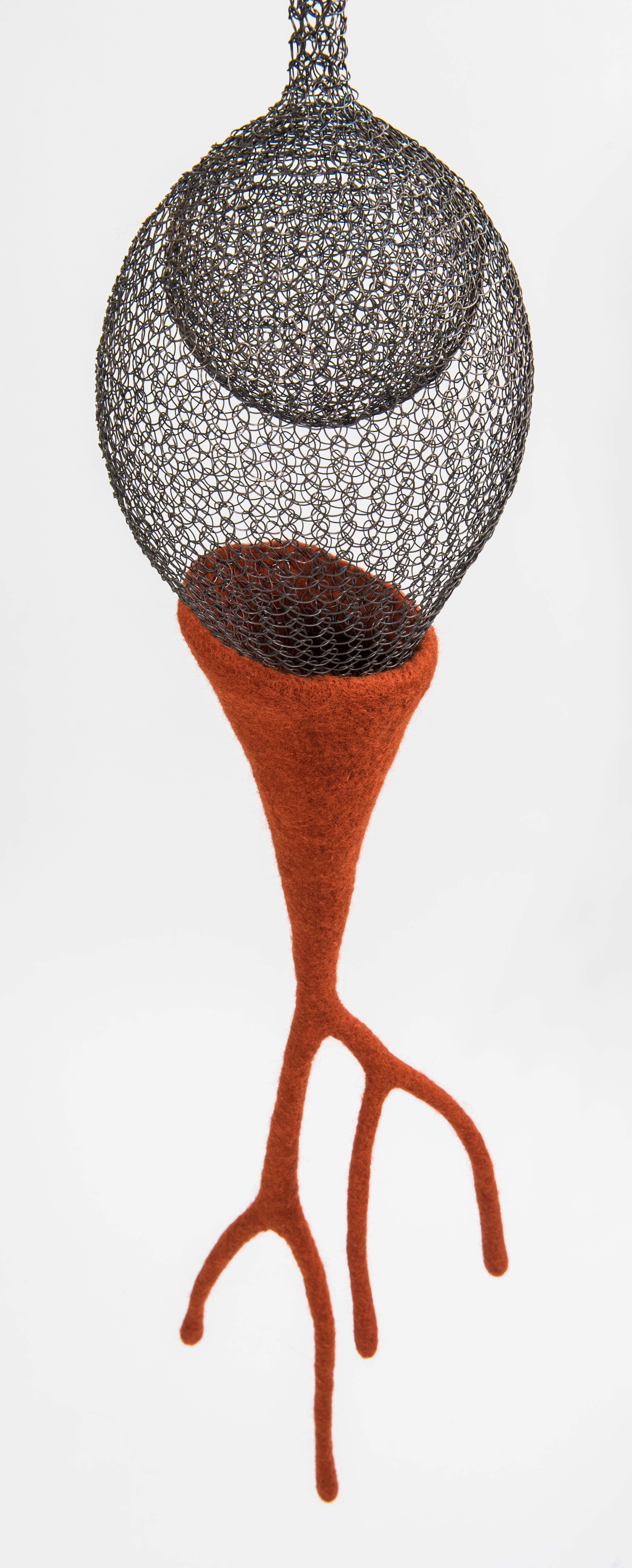 Elegance for its forms, sobriety for its materials, this sensual sculpture named « Being» is a meshwork combining with felted dark ginger wool, created and entirely handmade from annealed iron wire and felting wool by artist Delphine Grandvaux.  The