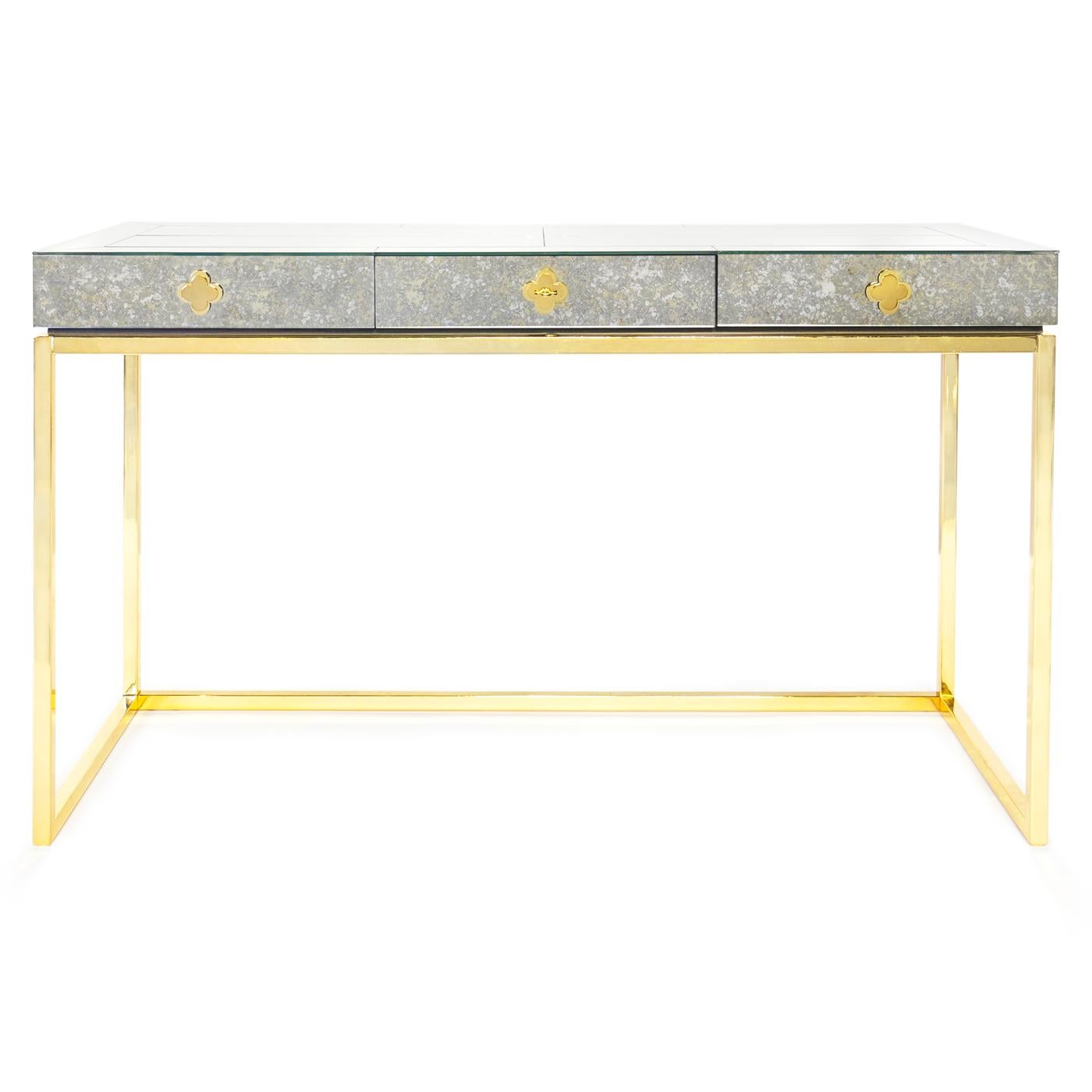 Reflectology. Minimalist forms meet Maximalist glamour. Antiqued mirror with a polished brass base. Our Delphine Desk features a single center drawer finished with bright robin's egg blue lacquer. Perfect in a starlet's study or as a bold finish for