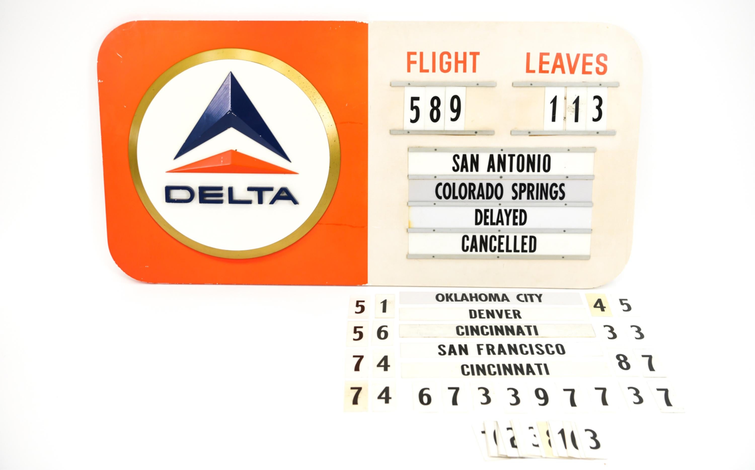Bold 1960's terminal sign for Delta Airlines, with movable destination cards and numbers.