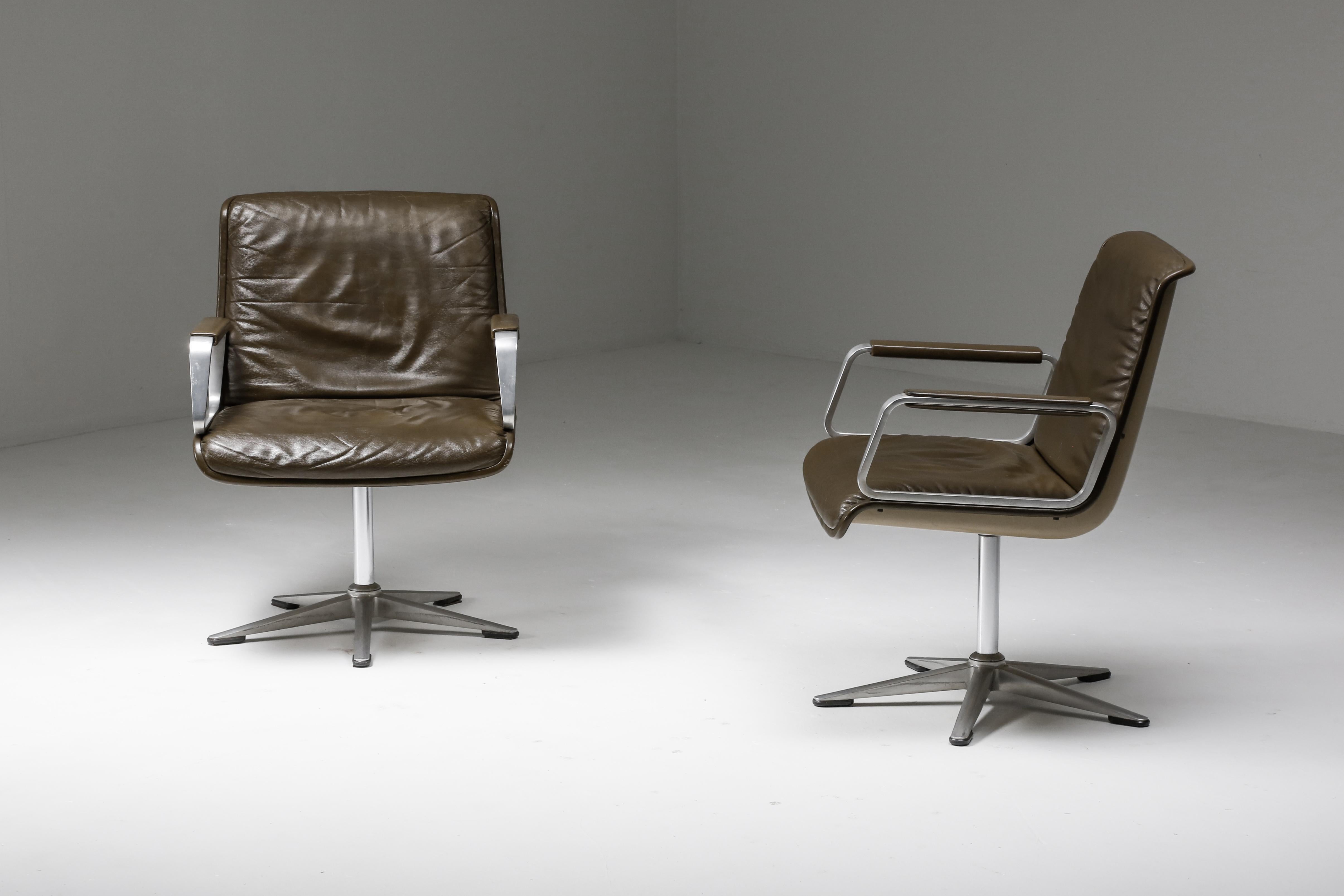 Delta Design Program 2000; Office Armchairs; Padded Leather; Aluminium; Wilkhahn; 1970s; Germany; German Design; Office Chairs; 

Pair of office chairs (Programm 2000) manufactured by Wilkhahn and designed by Delta Design (Michael Conrad, Detlef