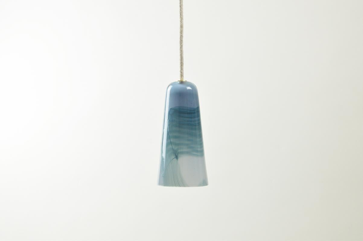 Delta Pendant by Atelier George
One of a Kind
Dimensions: Ø 9 x H 17 cm
Cord Length : 100 cm
Materials: Handblown Glass
230/240 Volts 50-60 Hz 3 Watt
Variation of colours available. For a custom length of the cord, please contact us.

All