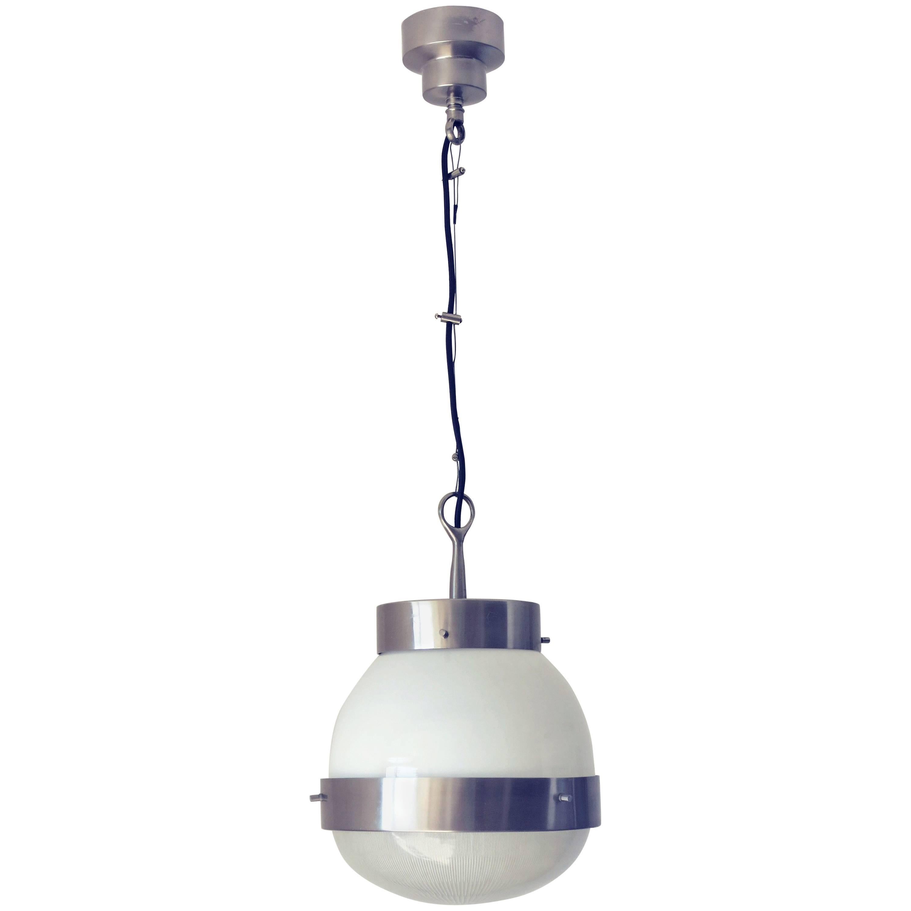 Original vintage pendant with frosted white and holophane glass on nickel frame / Designed by Sergio Mazza for Artemide / Made in Italy circa 1960’s
1 light / E26 or E27 type / max 60W each
Diameter: 12 inches / Height: 15.75 plus chain and canopy
1