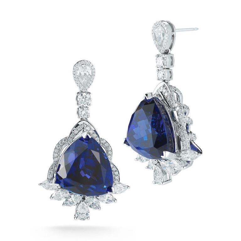 DELUXE TANZANITE EARRING Perfectly matched Tanzanite trillions dance among diamonds. Item: # 01793 Metal: 18k W Lab: Gia Color Weight: 44.54 ct. Diamond Weight: 6.44 ct.
