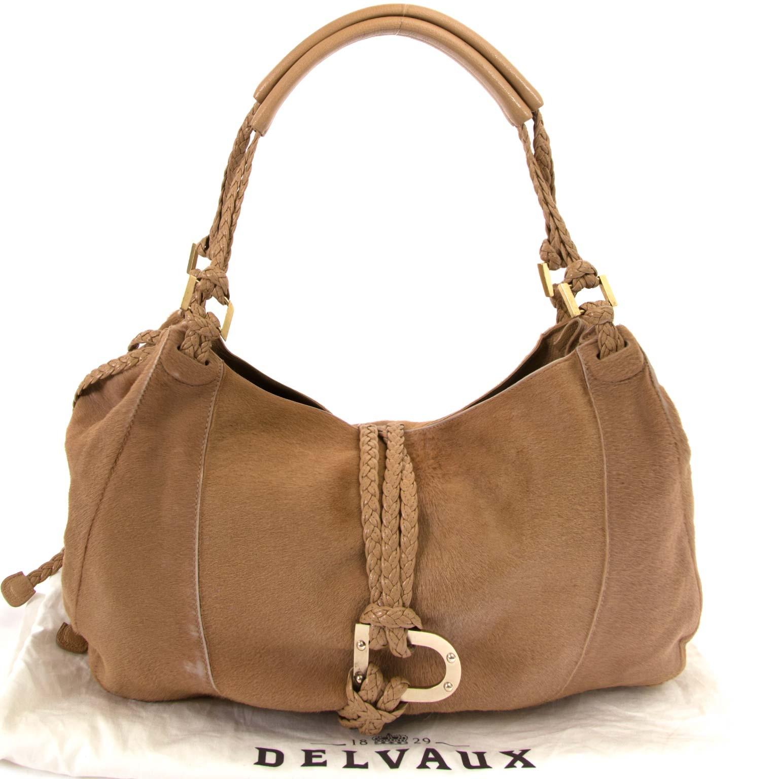 Good condition

Delvaux Beige Ponyhair Colette GM Bag

This beautiful Delvaux bag is crafted in beige ponyhair and features beige leather details.
The bag has two woven and leather handles, perfect to wear around the shoulder. It has gold-toned