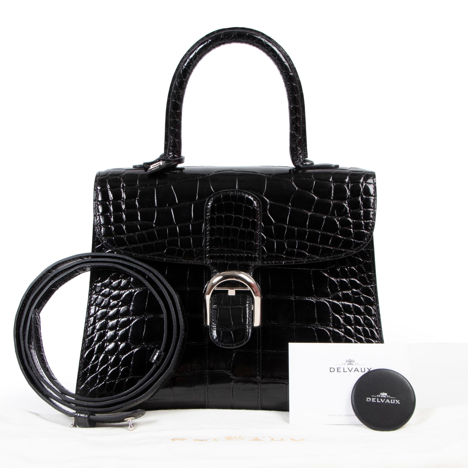 BRAND NEW - exotic!

Delvaux Black Alligator Brillant MM

Wowza! This ah-mazing Delvaux Black Alligator Brillant MM will take your breath away with its beauty.

Crafted out of 100% alligator skin, this shiny alligator bag is beautiful and