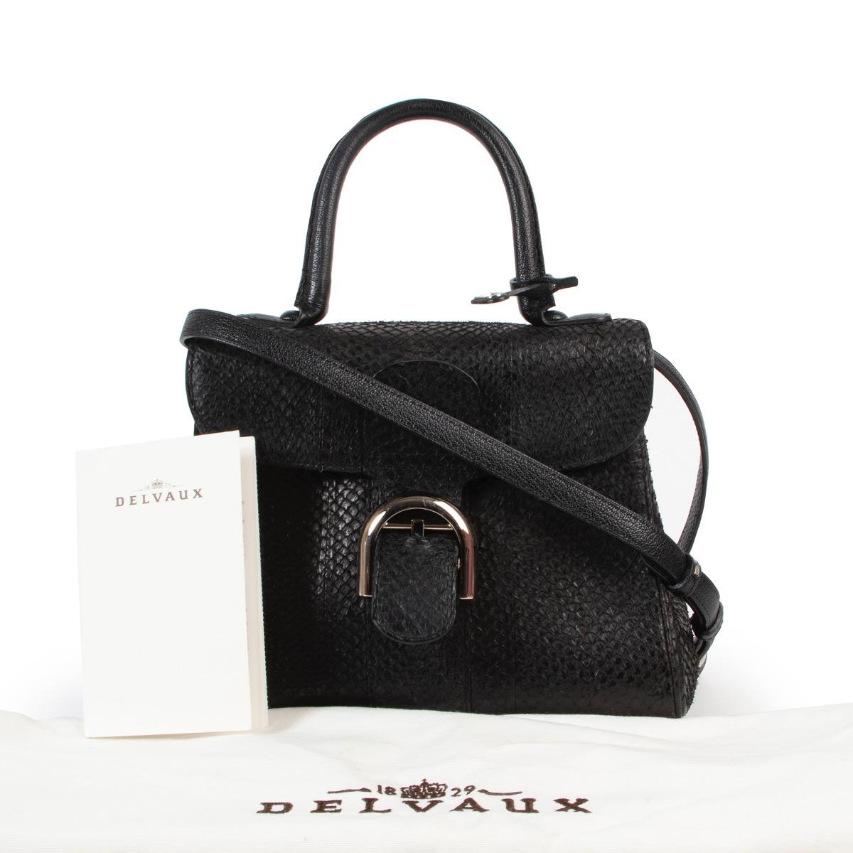 Delvaux Black Exotic PM Brillant

This Delvaux Brillant is a true one-a-kind beauty that makes our hearts beat faster.

Crafted in black exotic fish skin and finished with a silver toned D buckle. The iconic silver toned Brillant clasp gives acces
