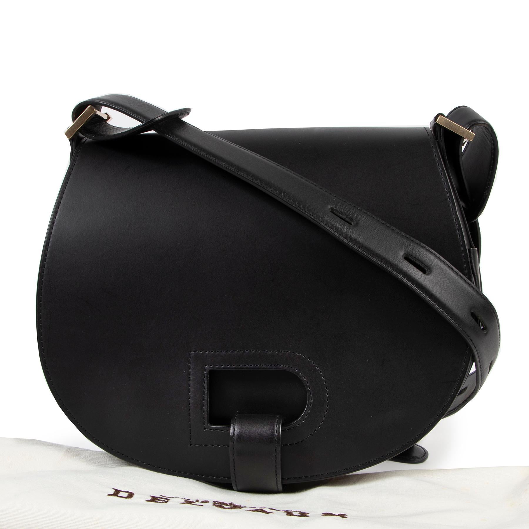 Delvaux Kate Black Crossbody Bag

We just adore this Delvaux Kate bag. 
Crafted in smooth black leather. The bag is finished with Delvaux's iconic D in the front. 
The shoulder strap is adjustable to your preferred length. 
Wear this timeless beauty