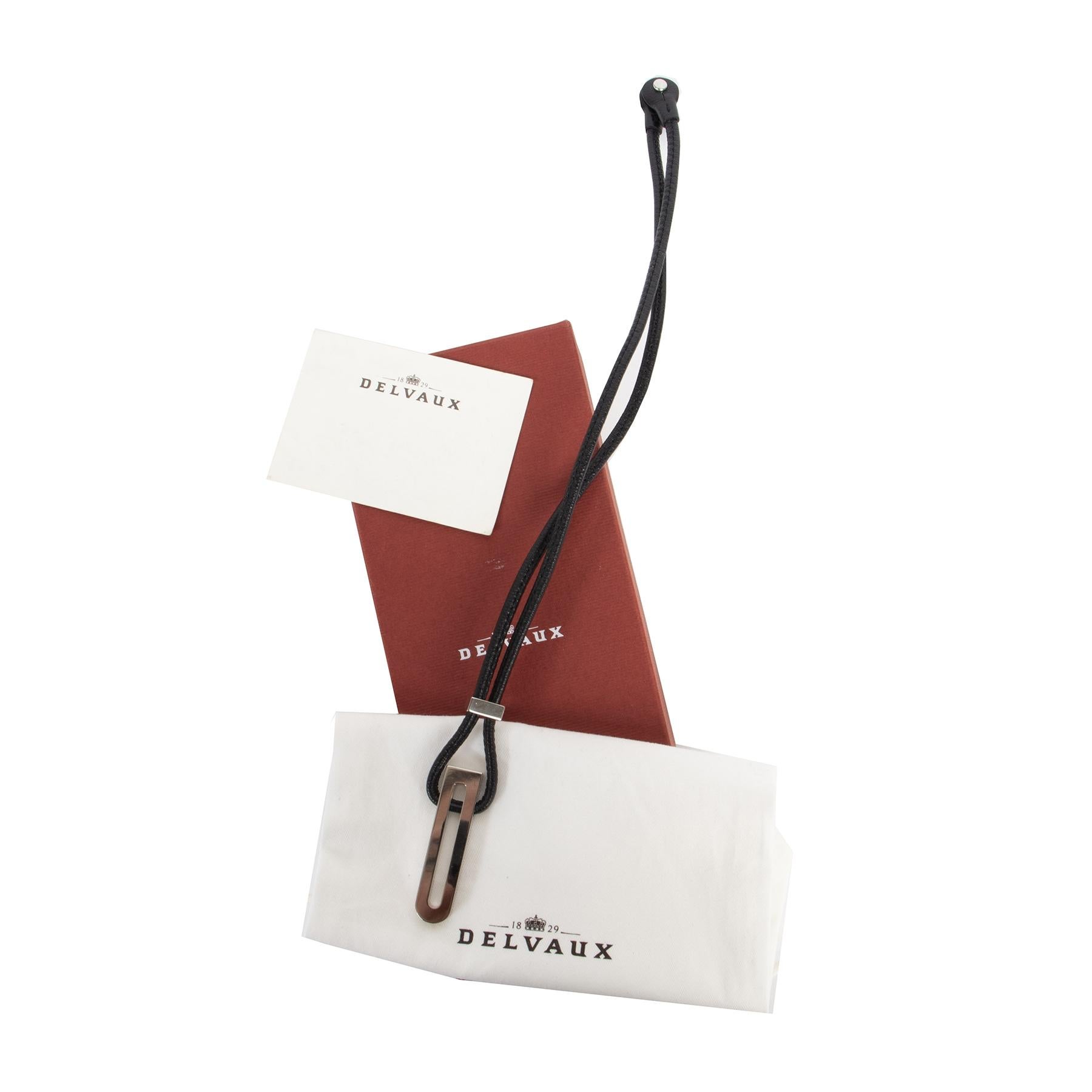 Very good preloved condition

Delvaux Black Leather Silver D Necklace

This minimalistic and timeless Delvaux necklace is perfect for every occasion, whether you're wearing it to a party or to work. The necklace is crafted in black leather and
