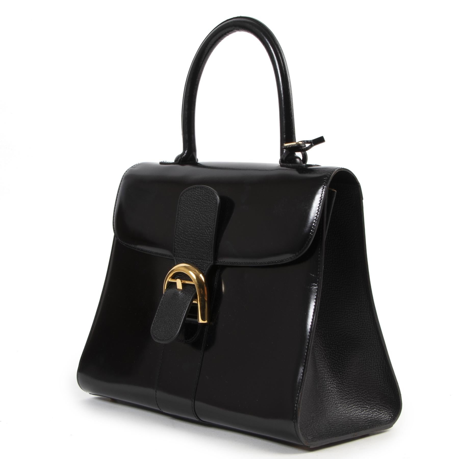 

Very good condition

Delvaux Black Magic Brillant MM

The Brillant from Delvaux is a must-have for every fashion lover. This bag comes in a beautiful black Magic leather which is the perfect middle way between box calf and patent leather. The