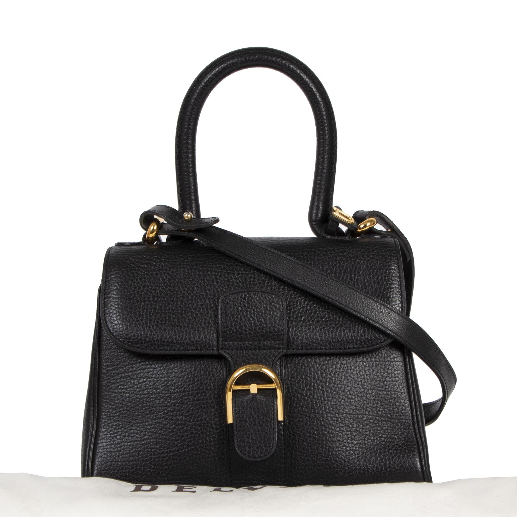 Very good condition

Delvaux Black Mini Brillant Bag

This bag is a true Belgian icon that will stay in style forever, the Delvaux Brillant. With the mini bag trend making a huge comeback, this Delvaux Brillant mini bag is the perfect piece to join