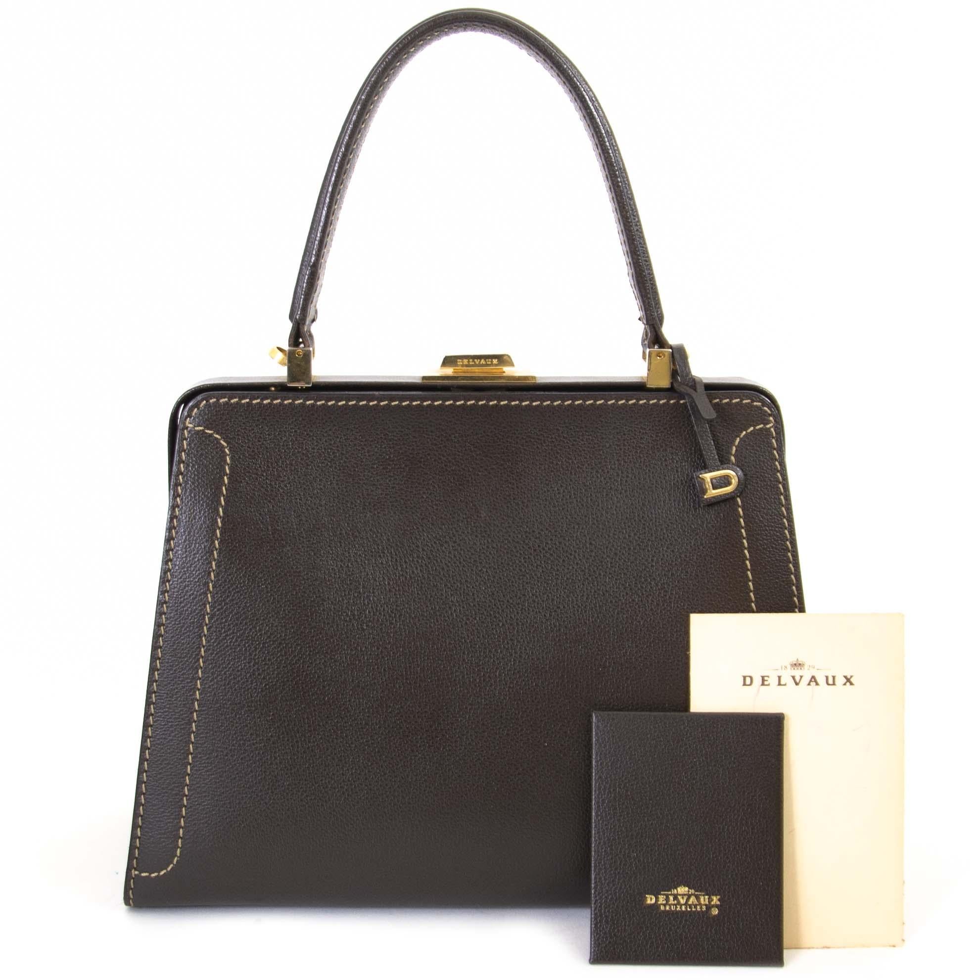 Good condition

Delvaux Brown Classico PM Jumping Bag

This gorgeous Delvaux bag exudes class and sophistication.
The bag is crafted from brown leather and features gold-toned metal hardware. The brown suede lined interior has one open pocket, one