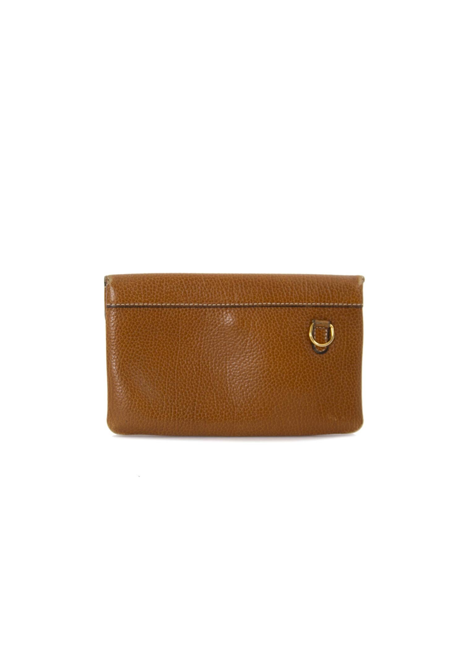 Good vintage condition

Delvaux Brown Leather Pouch

This beautiful Delvaux pouch is crafted from brown leather and features a gold-toned 'D' in the front.
The perfect pouch to keep some money and cards.