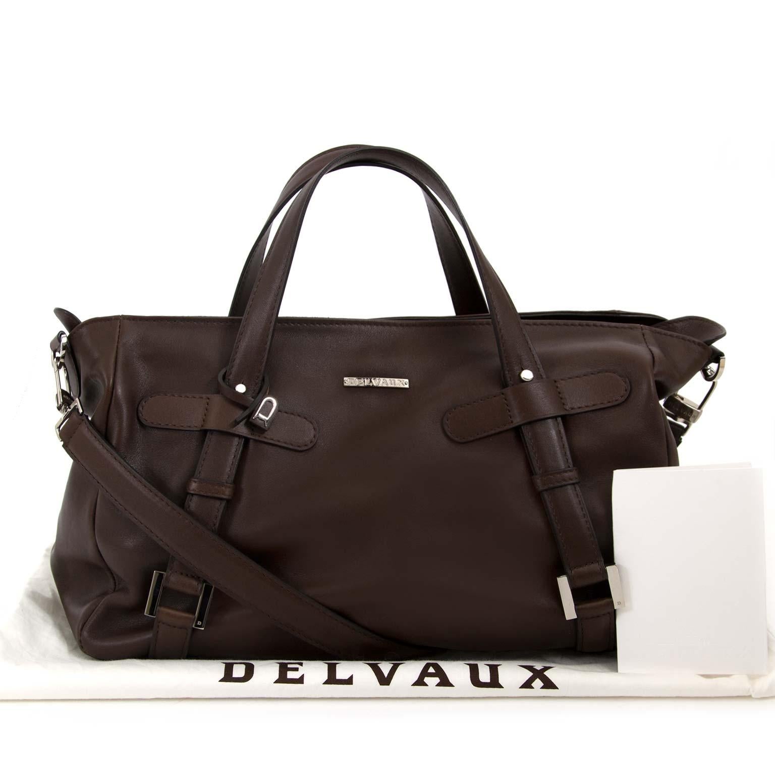 Excellent condition

Delvaux Brown Saint Germain Bag 

Add some elegance to your everyday outfit with this timeless Saint Germain bag by Delvaux. 
This marvelous top handle bag is crafted from brown leather and features silver-tone hardware. 
The