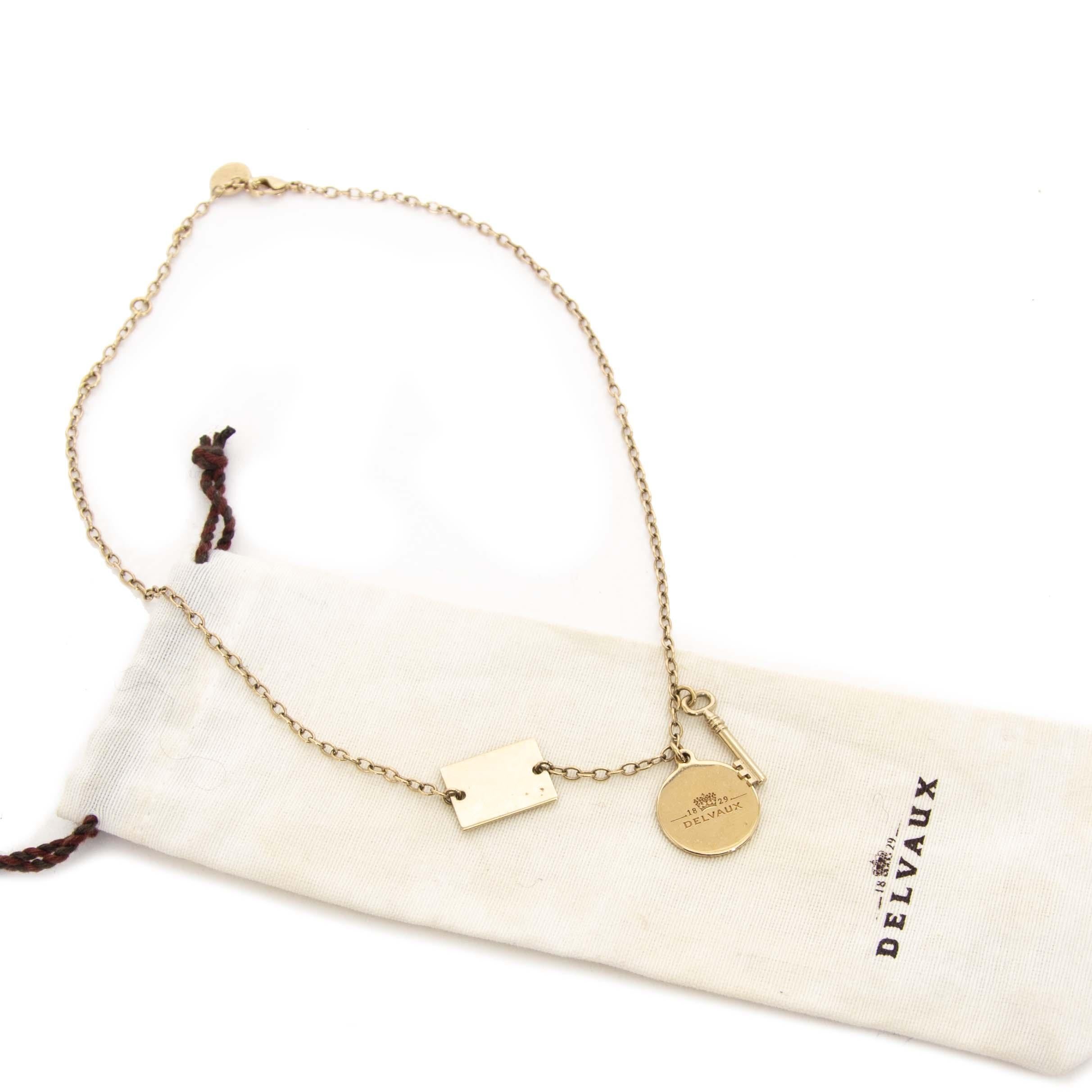 Good condition

Delvaux Charm Necklace

This dainty gold-toned charm necklace is just precious! It features three different charms: an envelope, a key and a round hanger with a crown and the letters Delvaux printed on it. This Delvaux Charm Necklace