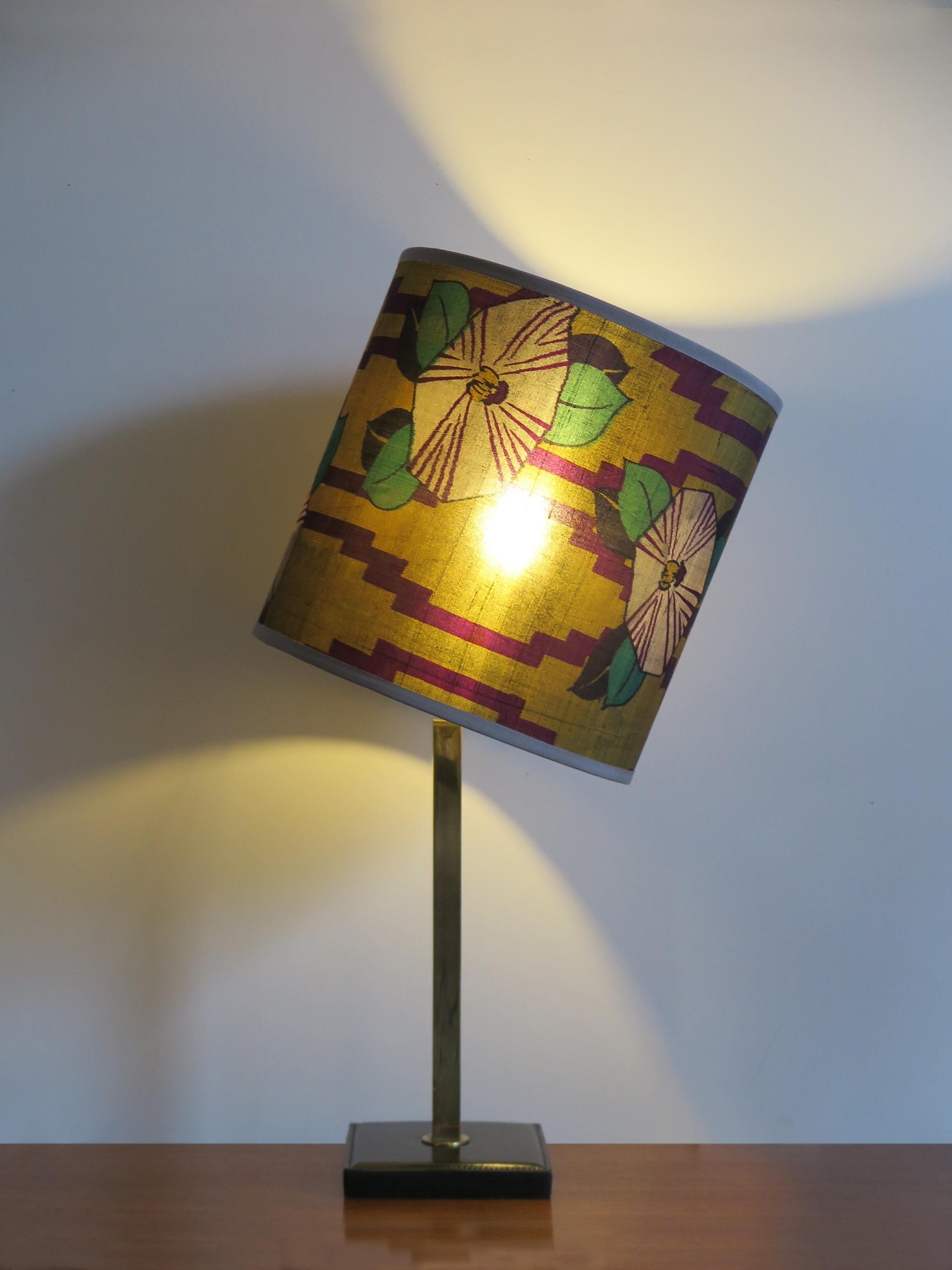 Table lamp designed by Delvaux and manufactured in Belgium with leather base, brass structure, orientable lampshade made new with antique silk Japanese kimono, circa 1950s.