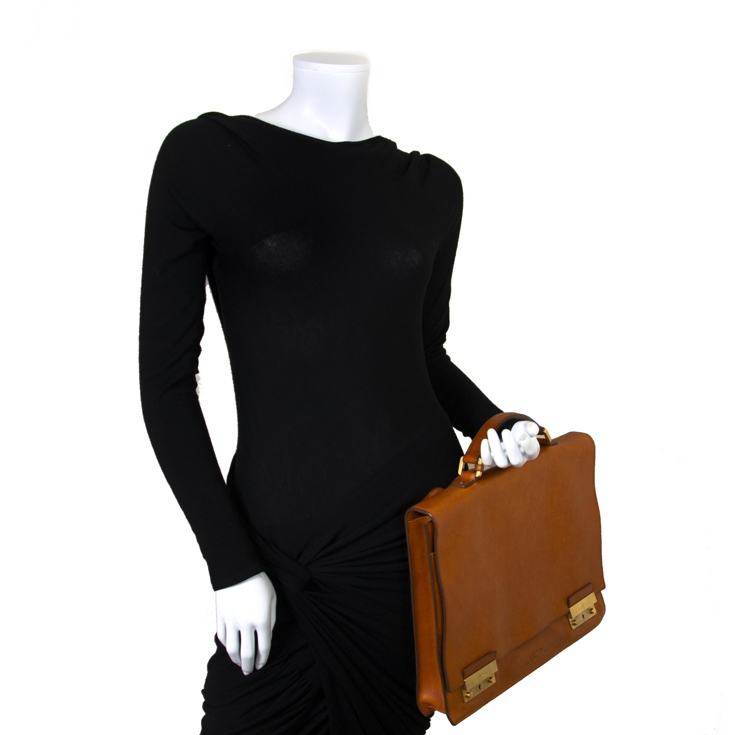 Very good condition

Delvaux Men's Vachetta Leather Briefcase

The oldest luxury leather goods house in the world (founded in 1829) and 100% family-owned has designed this stunning all leather briefcase. 
Made entirely by hand by a master craftsman