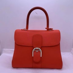 Borsa Delvaux Mini Brillant con manico superiore, in pelle di vitello rossa martellata, con dettagli dorati